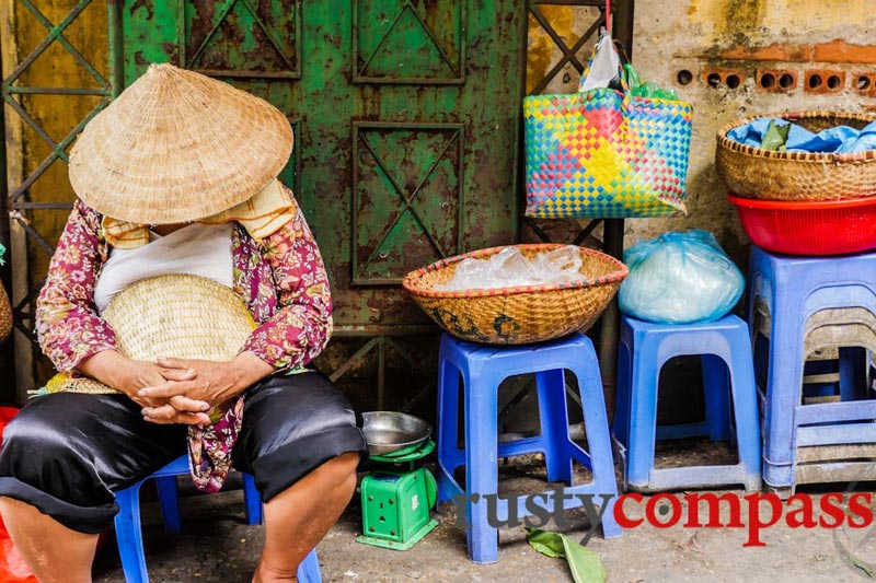 sleeping vendor hanoi street vietnam tours