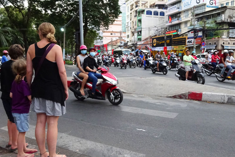 Vietnam — Crossing the road in Hanoi, Vietnam